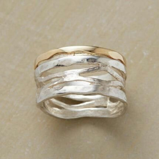 Bague creuse vintage en or et argent